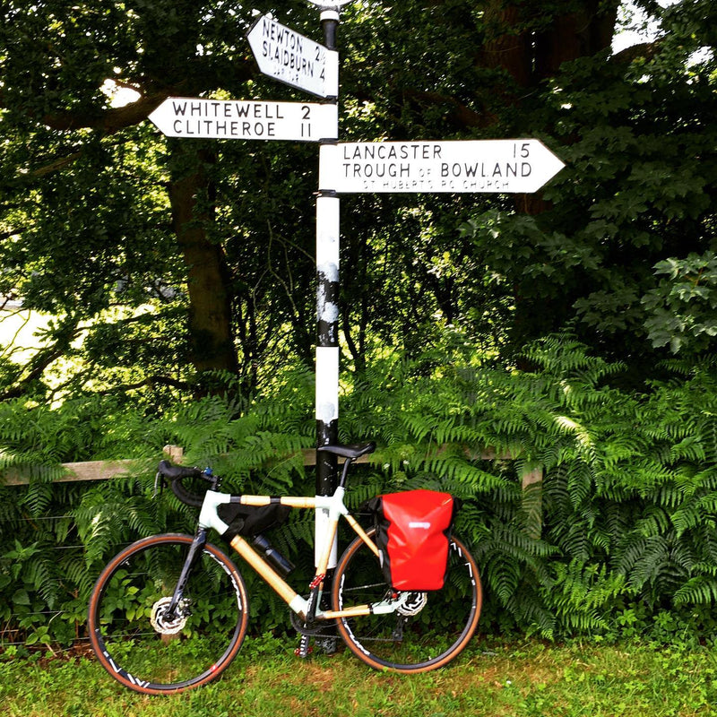 Toby touring on his bamboo gravel frame. Bamboo combined with flax is well suited to touring as bamb