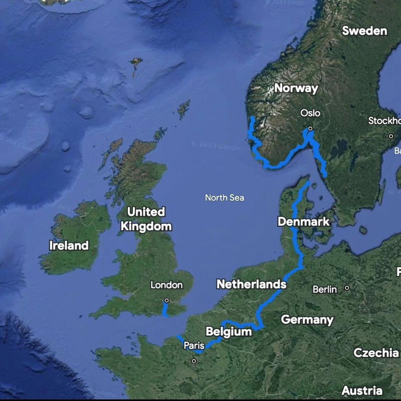 Satellite map tracing a blue route from southern England via France, Belgium, the Netherlands, Germany and Denmark to Norway