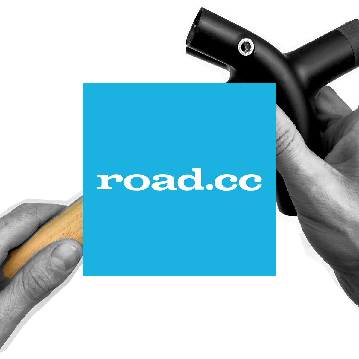 Road.cc logo over a monochrome shot of hands holding a bamboo tube and a black lug