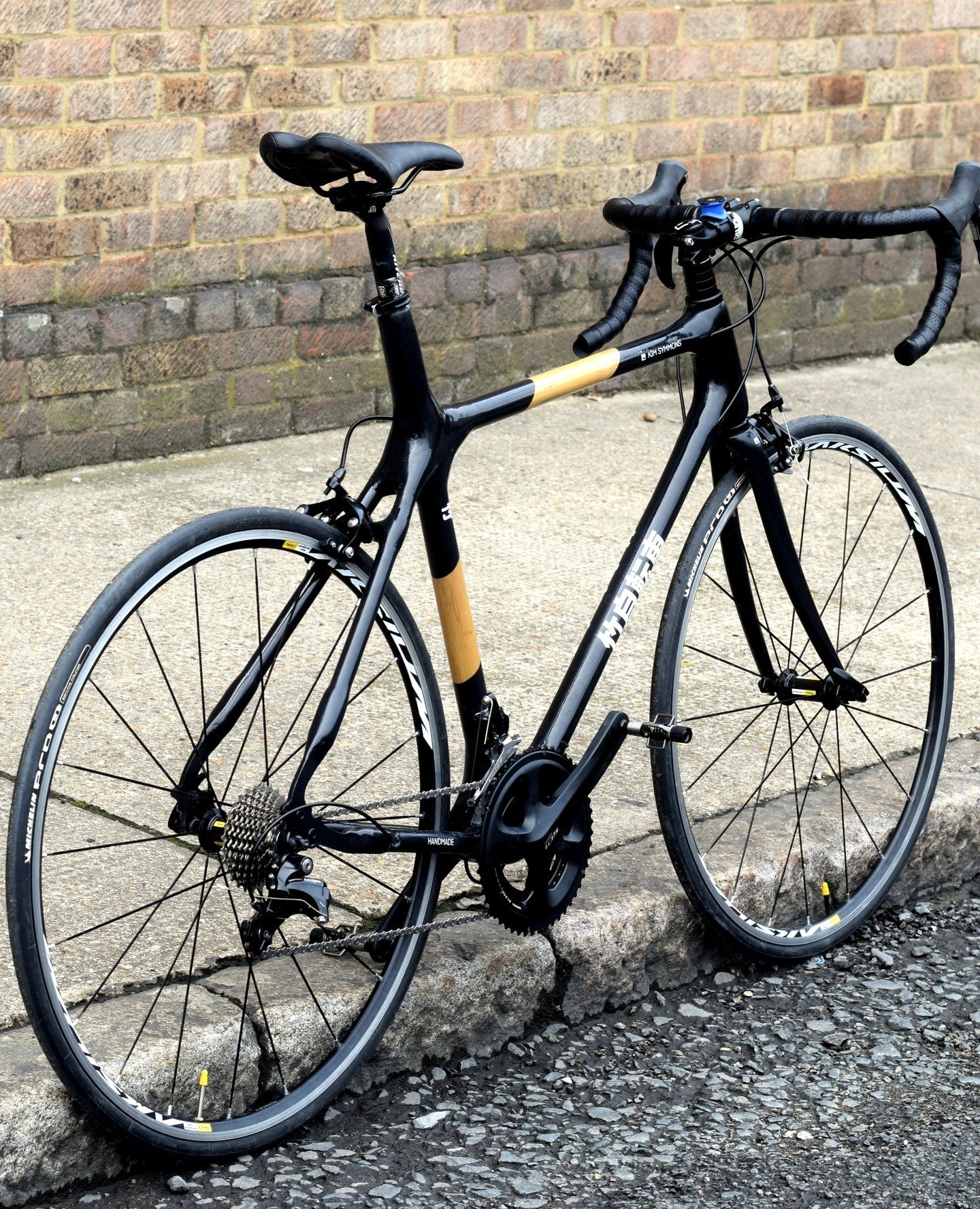 Built by Kim, using thick-walled Tonkin Bamboo which allows the lugs to be integrated into the frame
