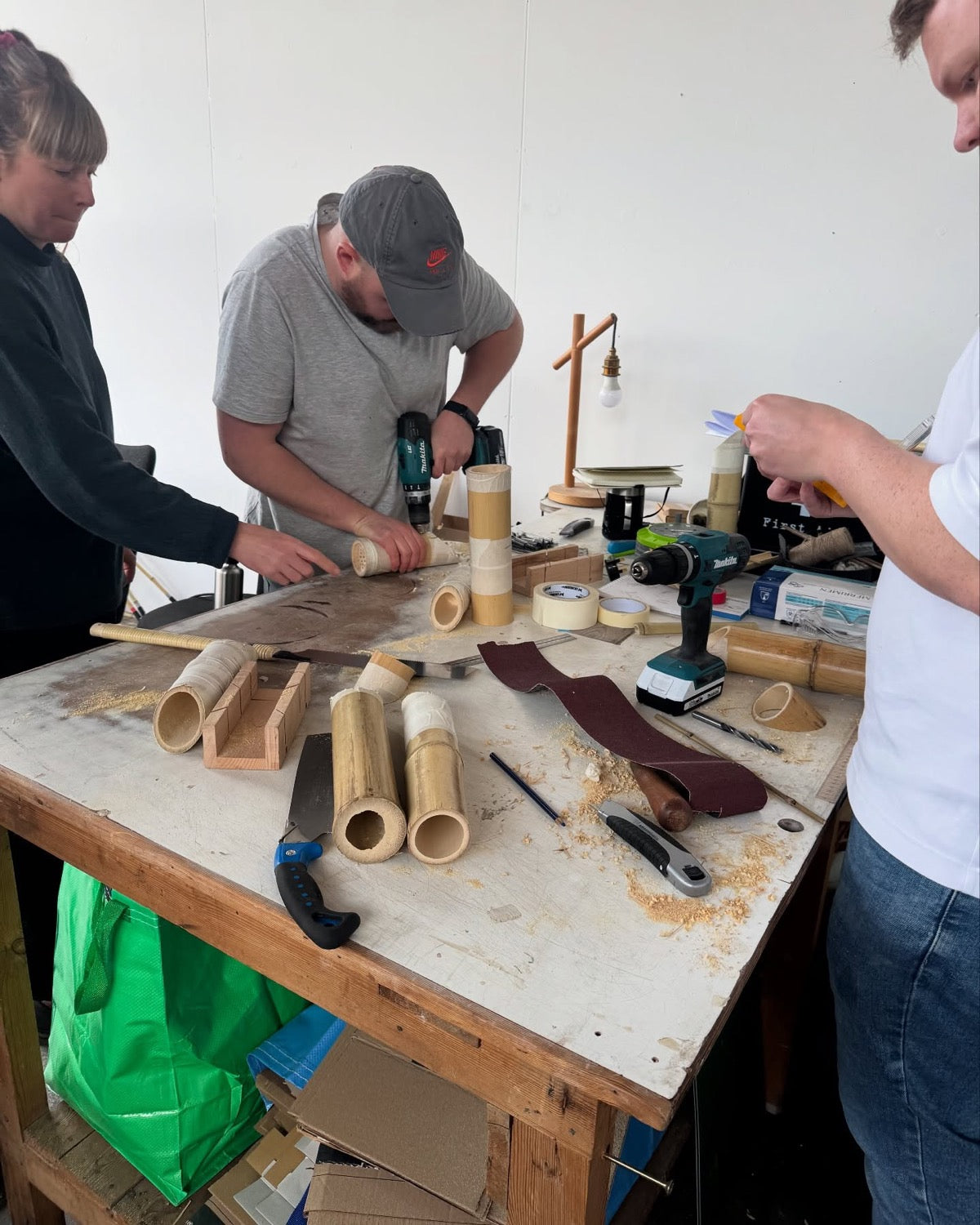 Builders with finished bamboo bikes at the Amersfoort partner workshop